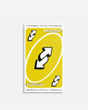 Card with 'REVERSE' text and arrows on a yellow background